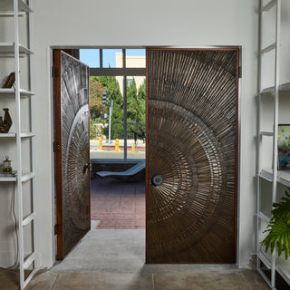 "Heroic Sunburst" Bronze Doors by Billy Joe McCarroll and David Gillespe for Forms and Surfaces