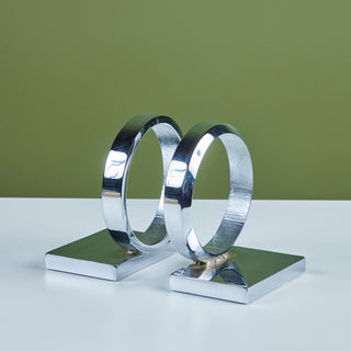 Circular Chrome Bookends in the Style of Curtis Jeré